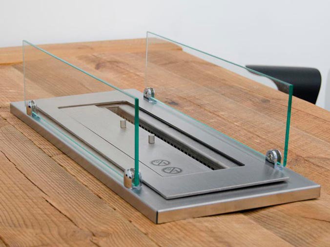 Bio burner integrated in a wood table